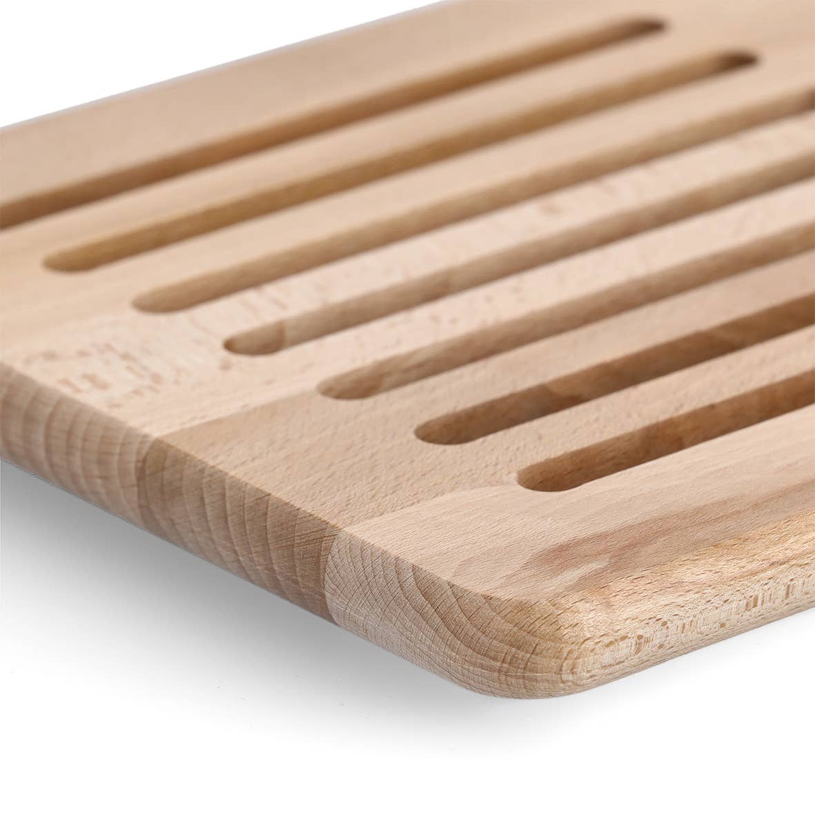 Grytunderlägg i bokträ